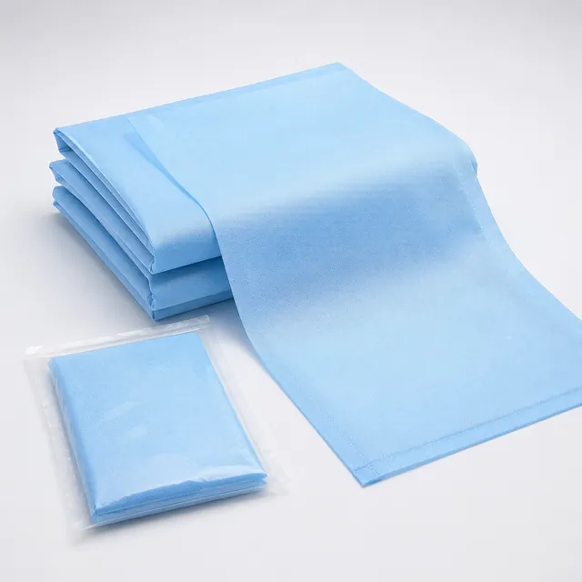Blue disposable hospital bedsheets, folded and packed