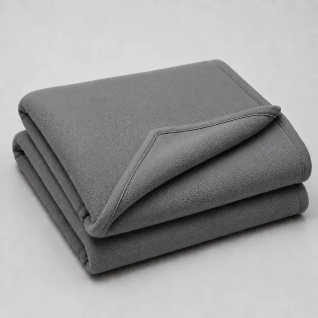 Folded grey fleece blanket