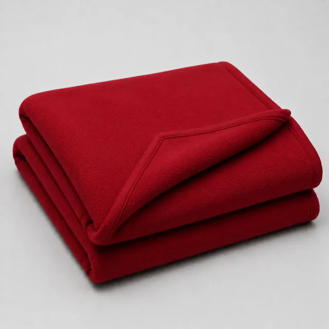 Folded red fleece blanket